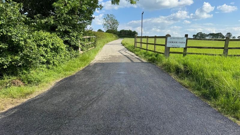 Tarmac Entrance with hot tar & granite roadway