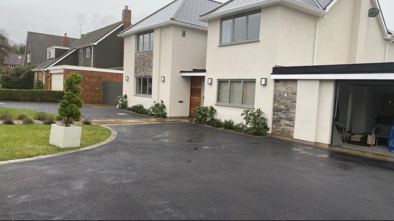 White House With Tarmac Driveway